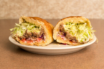 Cheesesteak with lettuce and tomato