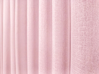 Fototapeta premium Light pink draped fabric closeup detail background , concept of fashion, home decor, material, interior design, clothing, 