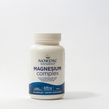 Davis, CA, 11 May, 2024. Bottle of Nordic Naturals Magnesium Complex, 225 mg, vegan, dietary suppement on white background, centered, front view.   