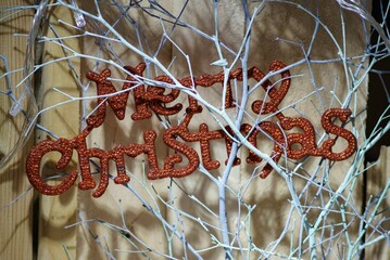Merry Christmas sign with branch tree