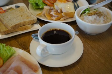breakfast with coffee in white cup