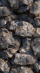 Closeup photograph highlighting the irregular, textured surface of a rock wall composed of varying sized stones and boulders. Rugged, geological formation