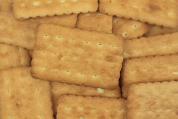 Pile of brown rectangular butter biscuits
