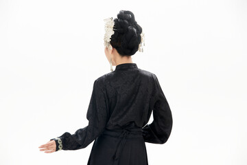 A woman wearing ancient Chinese clothing against a white background.