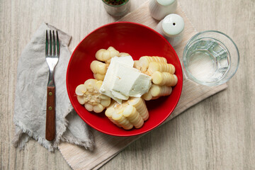 Cooked corn with pieces of un salted cheese andean food peru peruvian