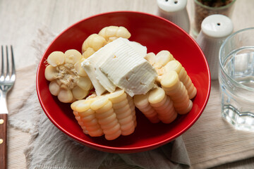 Cooked corn with pieces of un salted cheese andean food peru peruvian