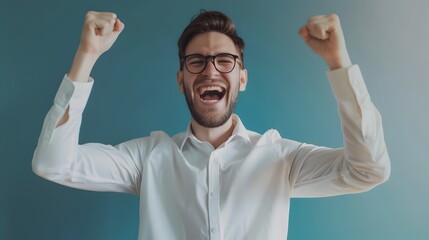 Fototapeta premium Energetic Young Manager Celebrating His Achievements in the Office
