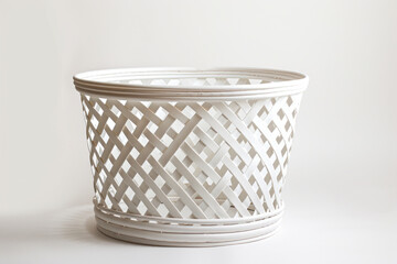 Elegant decorative planter with a lattice design in a soft gray color, perfect for indoor and outdoor gardening.