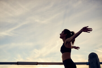 Woman, sky and arms in air at beach for fitness, exercise and freedom on mockup space. Runner,...