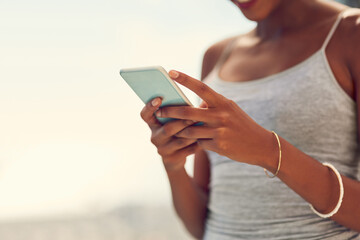 Woman, typing and outdoor with smartphone replying to text for communication, social media post or internet blog. Technology, female person and outside with mobile for online sharing and connectivity
