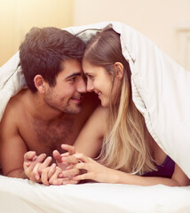 Couple, love and blanket in bedroom with care or affection, intimacy and passion for relationship...