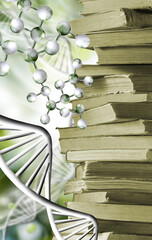 stack of books and stylized DNA models on a green blurred background