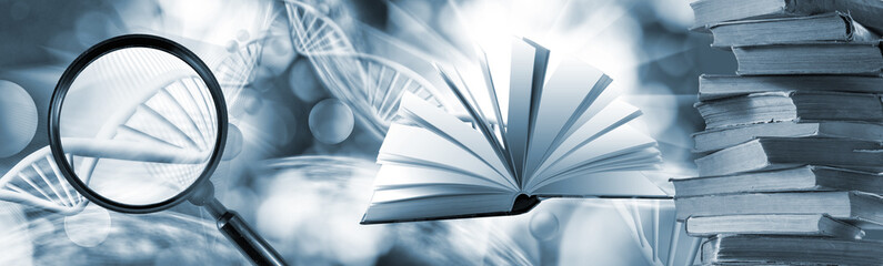open book, a stack of books and a magnifying glass through which a stylized DNA model is visible