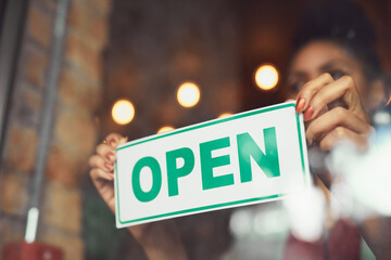 Woman, hands and cafe with open sign for welcome, small business or entry at indoor restaurant....