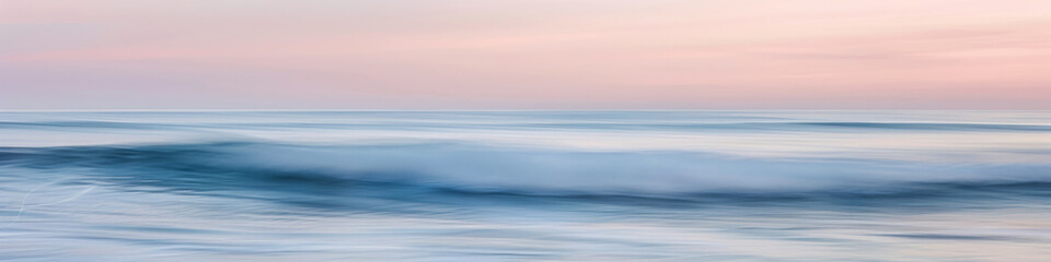 Fototapeta premium Tranquil Seashore with Gentle Waves Under Soft Sunset