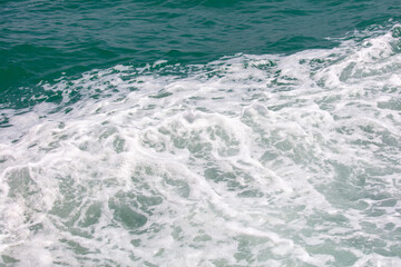 Fototapeta premium Waves in the sea abstract background. Texture