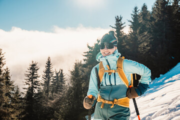 Mountaineer backcountry ski walking ski alpinist in the mountains. Ski touring in alpine landscape...