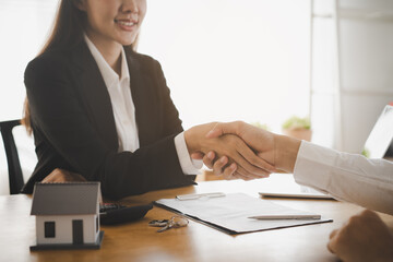 Real estate, success deal asian young woman handshake or shaking hand with landlord realtor, client...