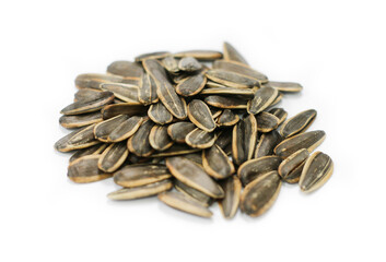 Closeup of sun flower seeds on a white background with clipping path
