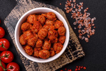 Delicious soy meat with tomato sauce, salt and spices