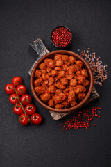 Delicious soy meat with tomato sauce, salt and spices