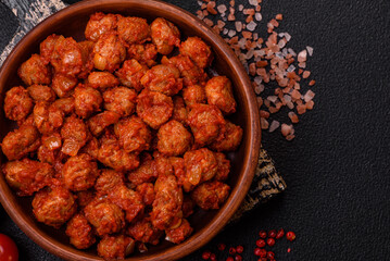 Delicious soy meat with tomato sauce, salt and spices