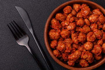 Delicious soy meat with tomato sauce, salt and spices