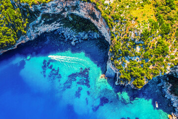 Blue caves on Zakynthos island or Zante Island, Greece. Beautiful views of azure sea water and nature with cliffs cave. Boat trip