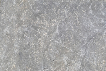 Stone texture worn by the wind and the sea of ​​the coast located on a wild beach.