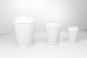 A Spectrum of Sizes Three White Coffee Cup Mockups