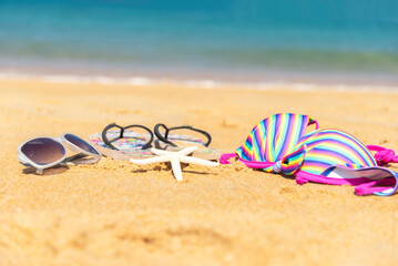 Beach accessories and Summer fashion tourism woman swimsuit Bikini with sunblock. Traveler Travel...