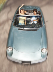 Driving, top view and couple in convertible car for travel with speed, holiday journey and...