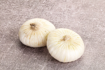 Raw white onion heap isolated