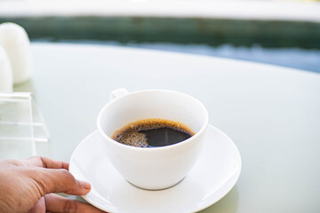Morning coffee by the pool