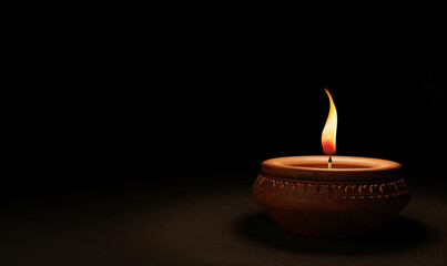 illustation of Diwali festival of lights tradition Diya oil lamps against dark background
A traditional Indian art of decorating the entrance to a house. Diwali festival holiday design. 
