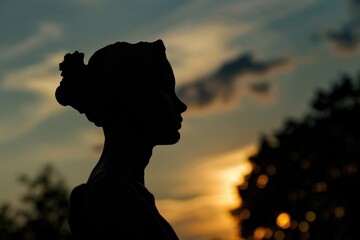 Silhouette of a woman with a flower in her hair, perfect for various design projects