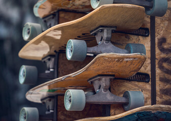 A stack of skateboards on a special outdoor stand