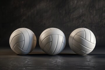 Three white volleyball balls arranged together. Suitable for sports and recreation concepts