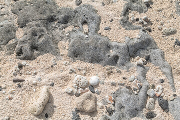 Sand with Beachrock. Beachrock is a friable to well-cemented sedimentary rock that consists of a variable mixture of gravel-, sand-, and silt-sized sediment. fragments of coral and shells . Geology

