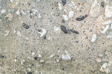 Beachrock is a friable to well-cemented sedimentary rock that consists of a variable mixture of basalt gravel , sand , and silt-sized sediment. fragments of coral and shells . Geology 
