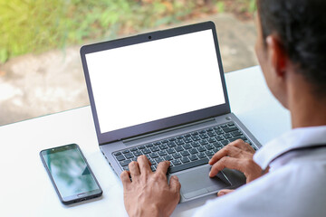 Man using laptop, white screen, concept