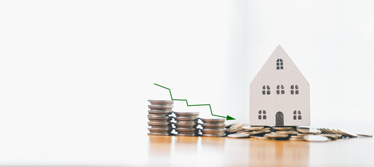 Low mortgage rate encouraged investment in the housing market, with arrows pointing to increased...