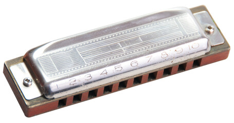 wood and metal harmonica on a white or transparent insulated backing