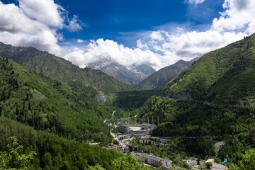 colorful beautiful mountain landscape, blue sky, green grass and trees, Almaty, Medeu, Kazakhstan, Alatau