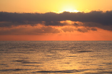 Sunset over the serene ocean