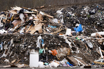 A landfill dump site with garbage everywhere.