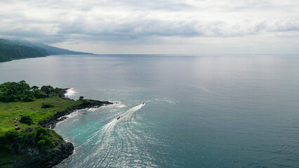 Beach with lush palm trees and crystal-clear water, south of sao tome