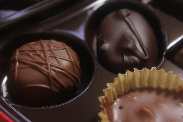 Close-up of chocolates in a variety of flavors