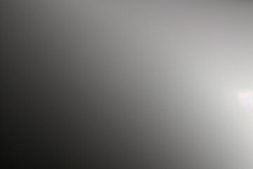 Naklejka premium Silver metallic texture with a brushed finish and light reflections.