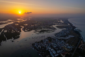 Drone view of Thu Bon river delta at sunset. Hoi An, Vietnam.